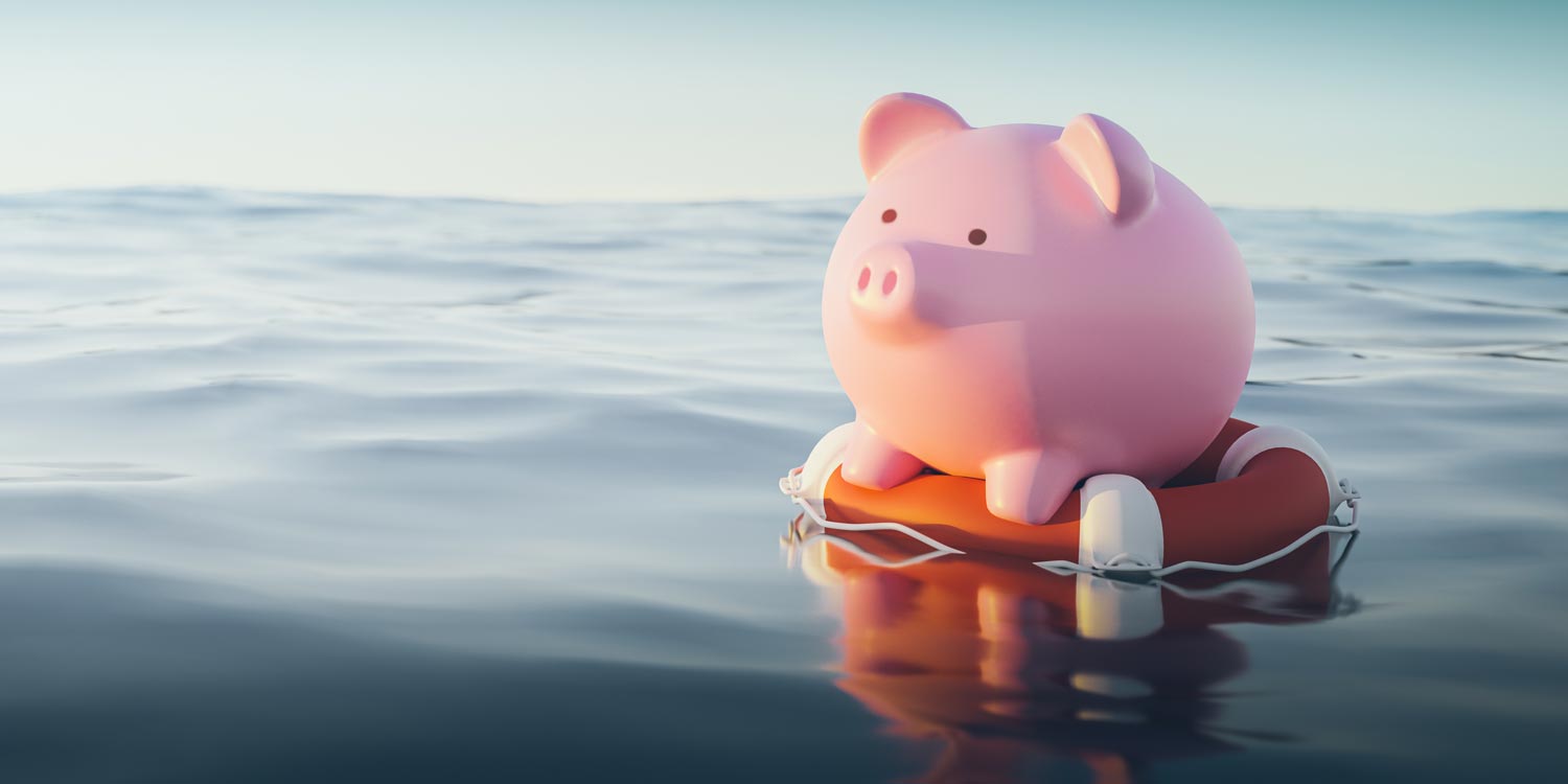 A piggy bank floating on a life saver