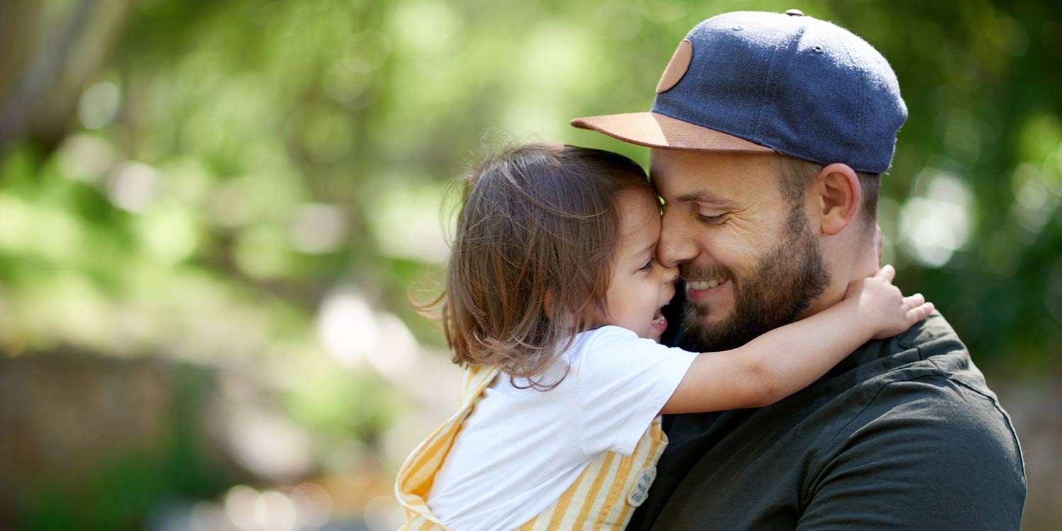 Shot of an adorable little girl having fun with her father in the park