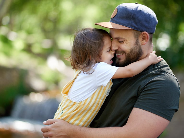 Shot of an adorable little girl having fun with her father in the park